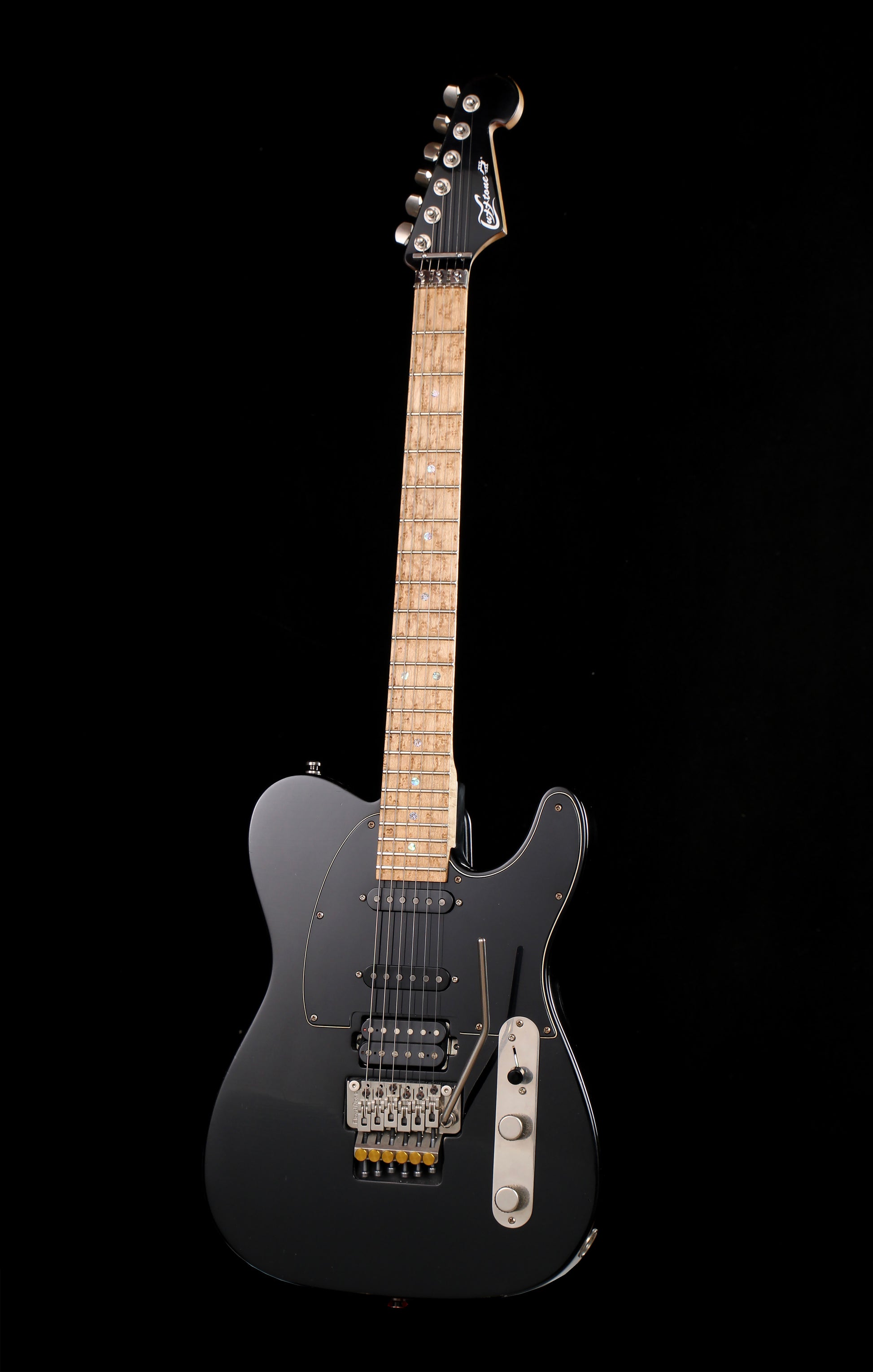 Luxxtone Choppa T Hot Rod Telecaster Lightly Aged Black Black electric guitar on a black background